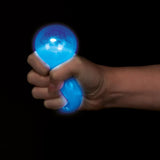 palline blu fluorescenti che si illuminano con la luce Ultravioletta